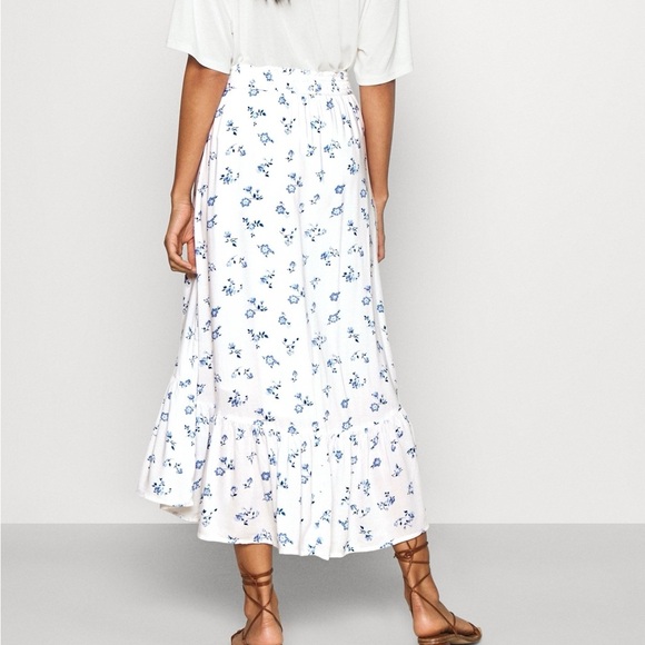 Hollister Dresses & Skirts - Hollister White Maxi Skirt with Blue Floral Print